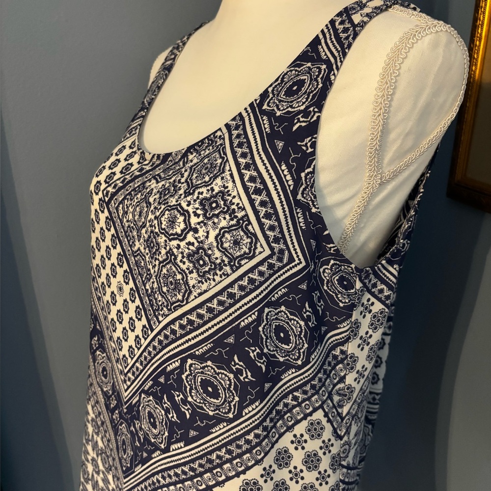 HeartSoul Blue & White sheer flowing blouse has a hi- lo hem w/cute back cut out
